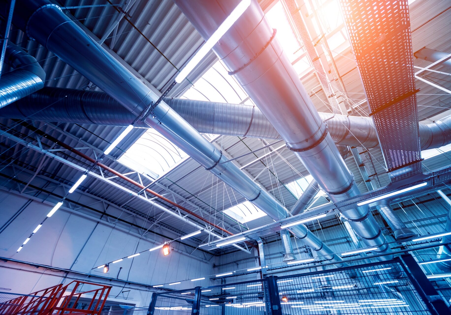 Air conditioning of buildings. Background of ventilation pipes. Laying of engineering networks. Industrial background